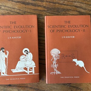 May include: Two brown hardback books titled "The Scientific Evolution of Psychology" with volume numbers I and II. The books feature illustrations of a man with a staff, a man writing, a brain, and a rat.