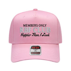 May include: A set of three ceramic mugs with a speckled, matte finish. The mugs are in shades of cream, light gray, and dark gray. Each mug has a simple, minimalist design, suitable for coffee or tea.