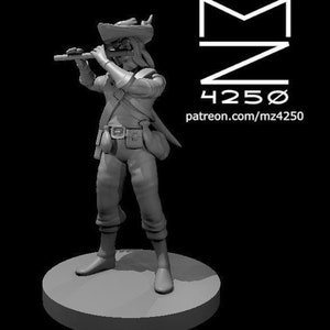 May include: A grey plastic miniature figurine of a person wearing a hat and holding a flute. The figurine is standing on a round base.