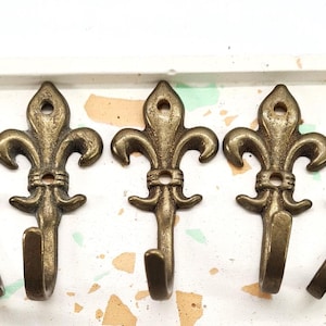 Vintage Brass Fleur De Lis Wall Hooks Set of 3, Ornate Mini Victorian Hangers for Jewelry, Keys, Picture or Décor, French Style Lovers Gift
