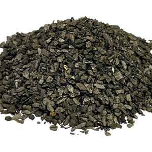 May include: A pile of black charcoal pieces, ideal for grilling or smoking.