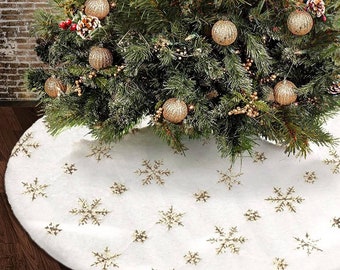 Falda de árbol de piel sintética con copos de nieve dorados