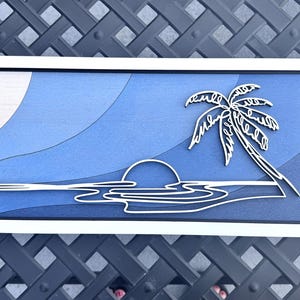 Ocean Wall Art – Layered Blue Wood Palm Tree Beach Decor – 18.5x8 Coastal Sunset Artwork – Tropical Home or Beach House Gift
