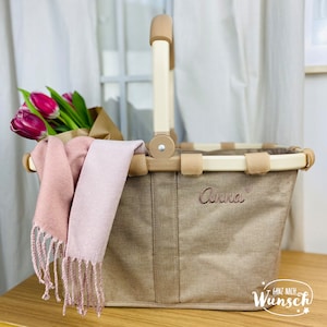 Reisenthel Carrybag in beige. Der Stick "Name" hat eine dezente beige Farbe.