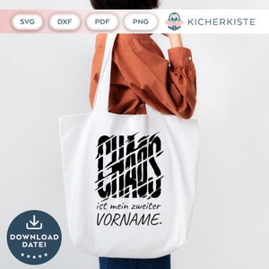 May include: White tote bag with black text that reads "Chaos is my middle name".