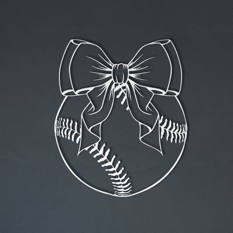 May include: A white metal baseball with a white bow tied around it. The baseball has stitching details.