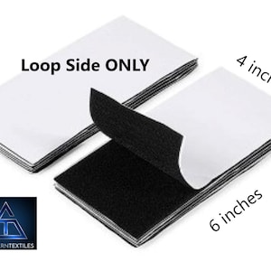 May include: A pack of 10 white hook and loop fasteners, also known as Velcro, with the loop side facing up. The pack is 4 inches wide and 6 inches long. The text "Loop Side ONLY" is printed on the pack.