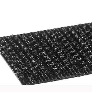 May include: Black hook and loop tape, also known as Velcro, with a textured surface.
