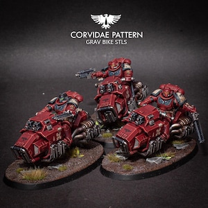 May include: Three miniature red and silver Grav Bikes with riders, set on oval bases with brown and green terrain. The bikes have detailed mechanical elements and are painted with precision. The image includes the text "CORVIDAE PATTERN GRAV BIKE STLS".