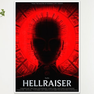 May include: A poster for the film "Hellraiser", showcasing a central figure with pins in their head against a red backdrop. The title "Hellraiser" is displayed, with additional text below. The poster is a piece of horror film merchandise.