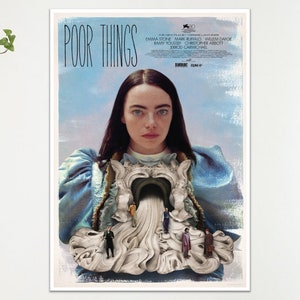 May include: A film poster for "Poor Things" with Emma Stone. The artwork has a surreal design with a woman in a blue dress at the center. The title is at the top, with the film's credits and a blue and white background.
