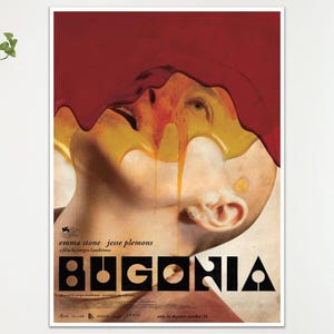 May include: A film poster for "Bugonia" with a striking image of a face with red and yellow paint dripping over it. The poster includes the names Emma Stone and Jesse Plemons.