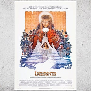 May include: A vintage movie poster for the film "Labyrinth" featuring David Bowie. The poster has a fantasy theme with a maze background and various characters. Text at the top reads "Jim Henson, George Lucas and David Bowie". The title "Labyrinth" is prominently displayed.