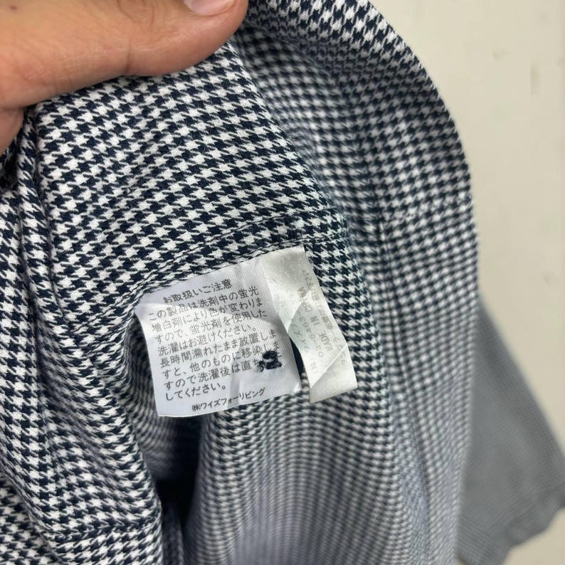 May include: A rustic wooden sign with the text "Welcome to our home" in white lettering. The sign features a distressed finish and a simple, inviting design, perfect for a front porch or entryway.