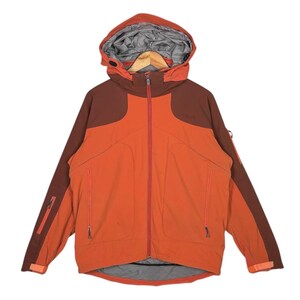 May include: An orange and brown hooded winter jacket with a full-length zipper. The jacket has two front pockets, a chest pocket, and a sleeve pocket. The hood is lined with gray fabric. The jacket is designed for cold weather and outdoor activities.