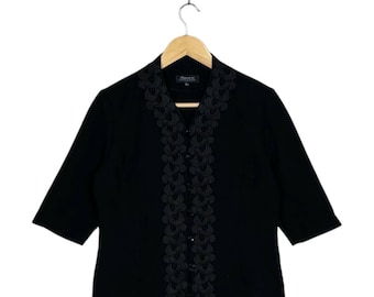 Vestido y blusa negros con bordados de Pierre Balmain Paris vintage