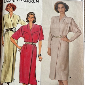 May include: A sewing pattern for a wrap-style dress. The pattern is for sizes 14-16-18. The pattern is by Butterick and designed by David Warren.