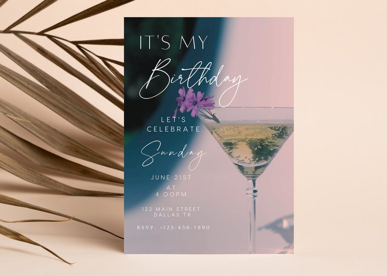 May include: A birthday party invitation with a blue and pink gradient background. The invitation features a martini glass with a flower garnish and the text "It's My Birthday", "Let's Celebrate", "Sunday", "June 21st", "At 4:00PM", "123 Main Street", "Dallas TX", and "RSVP: 123-456-7890".
