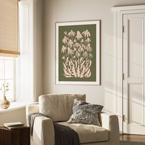 May include: A framed print of a pink floral design on a green background. The print features a cluster of stylized flowers with delicate stems and leaves.