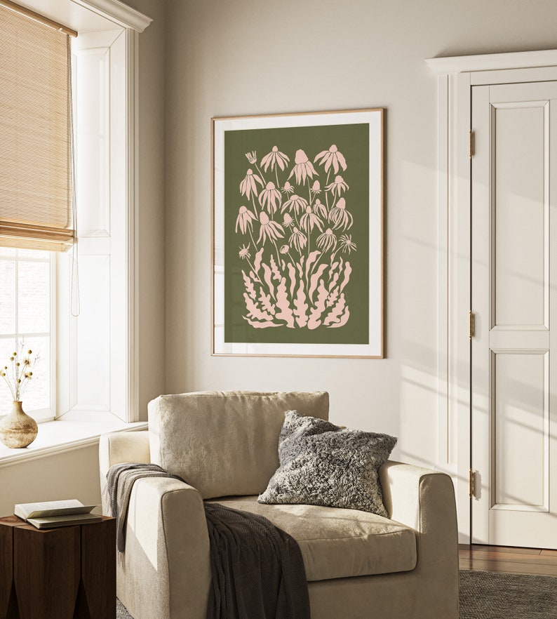 May include: A framed print of a pink floral design on a green background. The print features a cluster of stylized flowers with delicate stems and leaves.