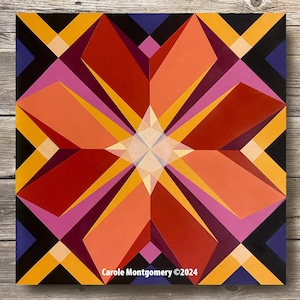 May include: Abstract geometric painting with a starburst design in shades of red, orange, yellow, pink, and purple. The painting has a black and white background with a signature at the bottom that reads "Carole Montgomery ©2024".