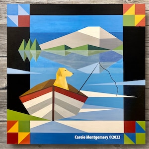 May include: A yellow dog sits in a red, white, and brown boat on a blue lake. The lake reflects a green mountain and trees. The painting is titled "Carole Montgomery ©2022".
