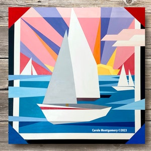 May include: A colourful abstract painting of three sailboats on a blue body of water with a pink, orange and yellow sunset in the background. The painting is framed in black with a red and blue border.