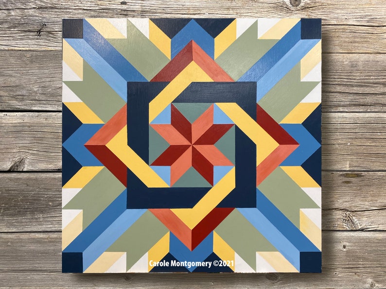 May include: Abstract geometric painting with a swirling pattern in shades of yellow, blue, red, green, and black. The painting is on a wooden background and signed "Carole Montgomery &copy;2021".