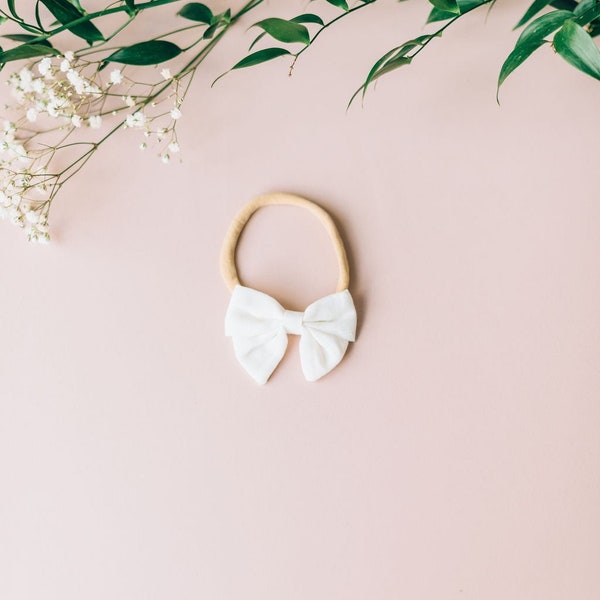 White Linen Baby Girl Bow