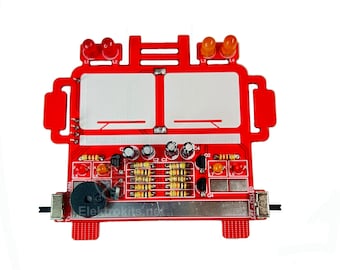 May include: A red circuit board with various electronic components, including LEDs, resistors, and capacitors. The board has a rectangular shape with cutouts and includes the text "Elekrokits.net".
