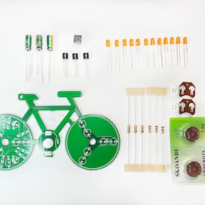 LED Blinking Bike, PCB Bike, Learn to Solder Kit, DIY Circuit Kit. Group, home, or school project.