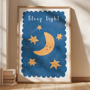 May include: A framed art print featuring a whimsical design. The artwork showcases a crescent moon and stars in shades of yellow against a blue background. The words "Sleep tight" are written at the top. The frame is a light brown color.