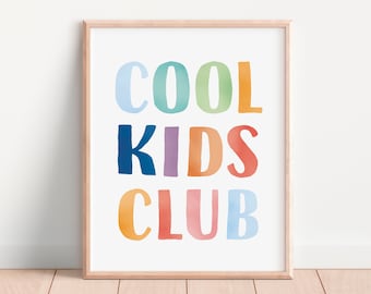 May include: A framed print with the text "COOL KIDS CLUB" in colorful, watercolor-style letters.