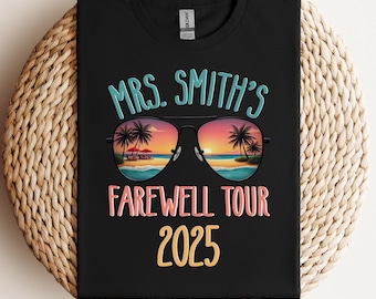 May include: Black t-shirt with the text "Mrs. Smith's Farewell Tour 2025" in white and pink. The text is surrounded by a pair of sunglasses with a beach scene reflected in the lenses.