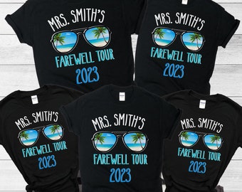 May include: Five black t-shirts with the text "MRS. SMITH'S FAREWELL TOUR 2023" and a graphic of sunglasses with palm trees and a beach scene.