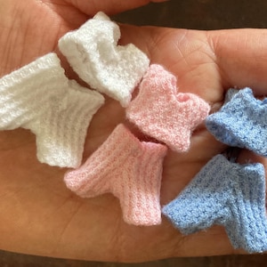 knit top and bottom in white pink or blue