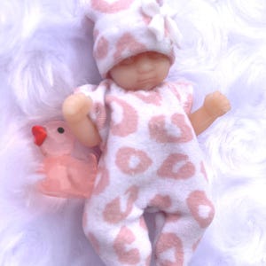 pink cheetah sleeper pieces for 2.5 inch silicone doll