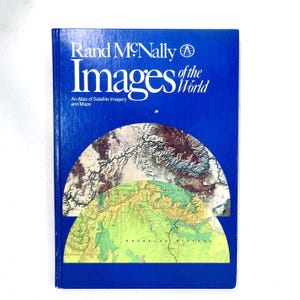 May include: A blue book titled "Images of the World" by Rand McNally. The cover features a satellite imagery map of the world. The book is an atlas of satellite imagery and maps.