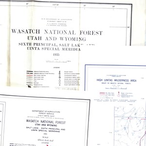 May include: A collection of vintage maps from the U.S. Department of Agriculture, Forest Service. The maps detail the Wasatch National Forest in Utah and Wyoming, with dates from 1935 and 1951. Includes legends and scales for navigation.
