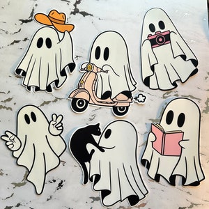 Cute Ghost Bumper Sticker, Decal for Cars, Laptops, Water Bottles. Cowboy, Scooter, Librarian, Photographer, Cat mom, and Hippie.
