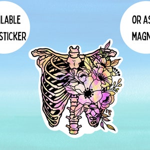 May include: A watercolour illustration of a ribcage with flowers growing from it. The flowers are pink, yellow, and white. The ribcage is outlined in black and has a watercolour effect. The background is a light blue.