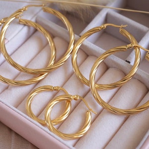 Gold Twisted Hoop Earrings . Gold Everyday Wear Hoop Earrings . Stainless Steel . 25mm, 40mm, 45mm Hoops . Simple Hoop Earrings For Women