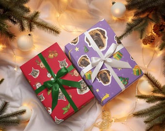 Wrapping paper for christmas gifts with funny dog or cat face