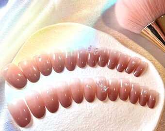 Oval round shape nude nails set with pearls and bowtie gel nails press on nails nude beige ombre