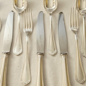 Ménagère Christofle Chinon 18 pièces pour 6 personnes en métal argenté, élégance classique française, style Art déco vintage.