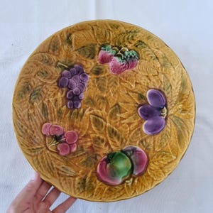 Large Sarreguemines deep plate in art nouveau slip 1900 with fruit decoration