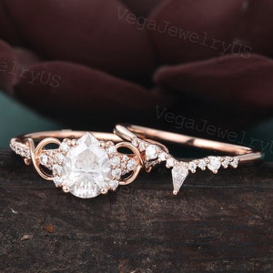 Pear shaped moissanite ring set Unique rose gold diamond ring set Dainty bridal set Twist ring set Promise ring Crossed anniversary ring
