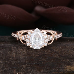 Pear shaped moissanite engagement ring Unique rose gold diamond ring Dainty bridal ring Twist ring promise ring Crossed anniversary ring