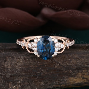 Oval London blue topaz ring Unique rose gold engagement ring Dainty moissanite ring Diamond bridal ring Twist marriage ring Crossed ring