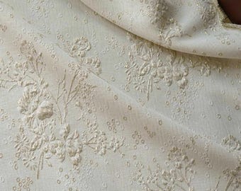 Golden white jacquard designer brocade embossed fabric by meter